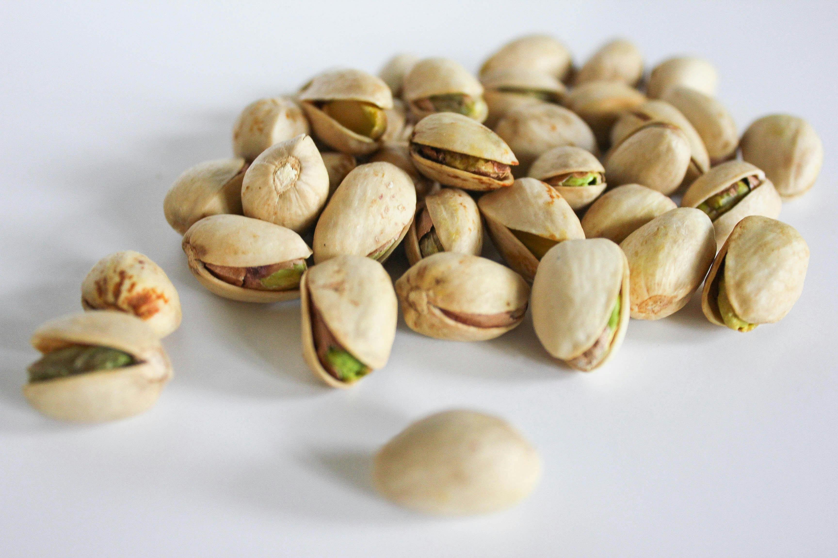 Close Up Photo of Bunch of Pistachios, photo by Alexis Lozano, Pexels license